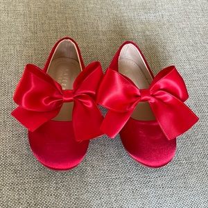 Red satin Mary Jane flats with satin bow